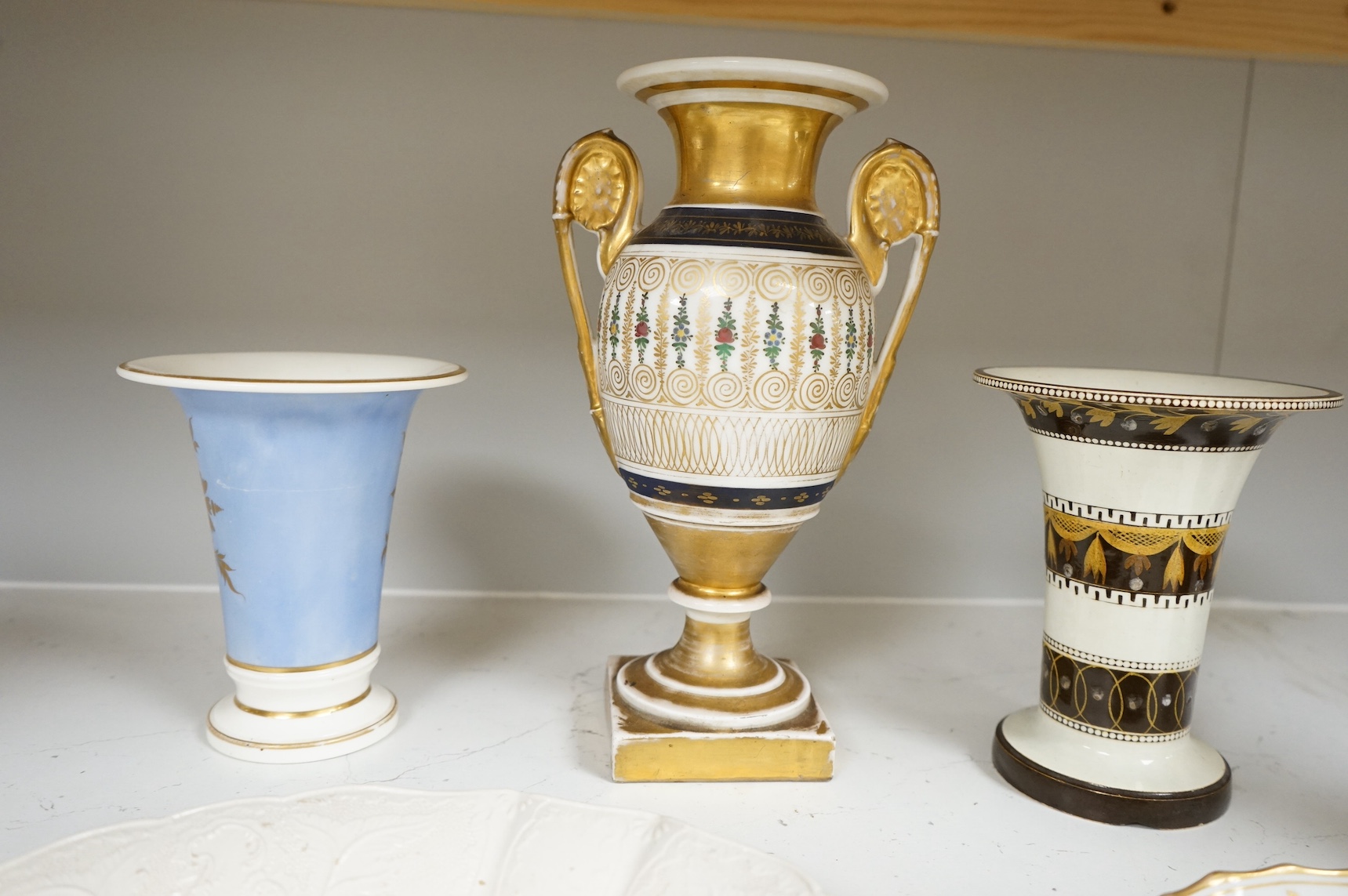 An 18th century salt glazed stoneware dish, another dish and three various vases, tallest 24.5cm. Condition - varies